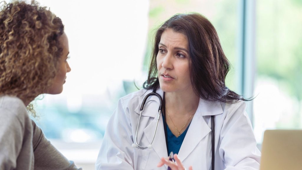 Doctor discussing stimulant medications and treatment options with a patient.