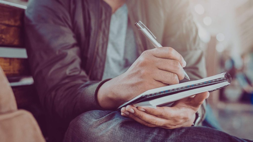 Writing a relapse prevention plan to manage cravings and reduce relapse risk.