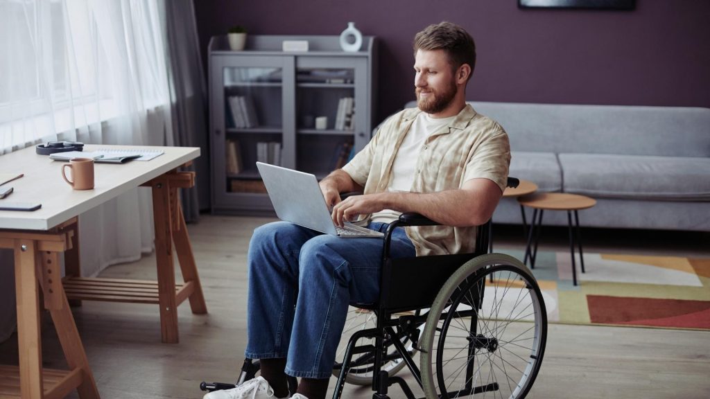 Benefits of a Virtual IOP for Addiction Recovery 2 Disabled virtual IOP participant attending online addiction treatment from home