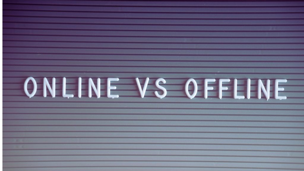Virtual IOP vs. In-Person IOP: What’s Right for You? 1 Online vs offline sign illustrating the choice between virtual IOP and in-person addiction treatment programs.