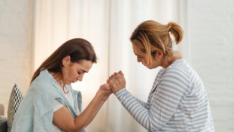 How to Help Someone Having a Panic Attack a friend tries to be encouraging and physically present.