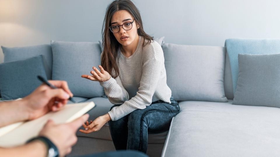 a woman undergoes a Drug and Alcohol Evaluation with an addiction counselor.